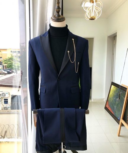 A Navy Blue Peak lapel Tuxedo suit