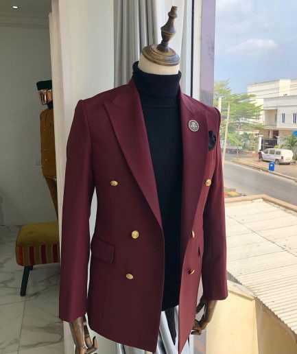 A Burgundy Double Breasted peak lapel with Gold Button suit