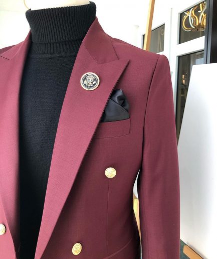 A Burgundy Double Breasted peak lapel with Gold Button suit