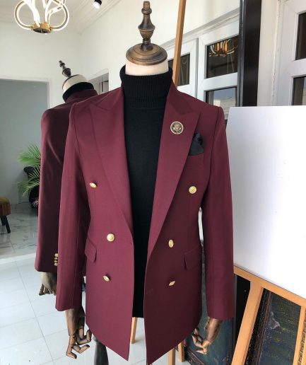 A Burgundy Double Breasted peak lapel with Gold Button suit