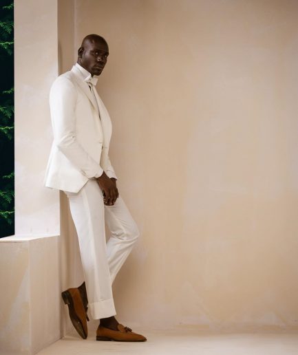 An Ivory White Shawl and peak lapel Tuxedo suit