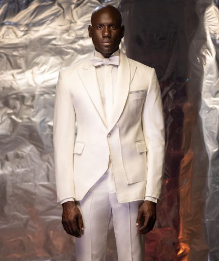 An Ivory White Shawl and peak lapel Tuxedo suit