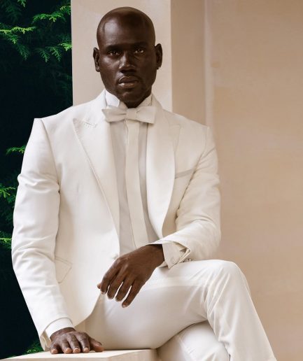 An Ivory White Shawl and peak lapel Tuxedo suit