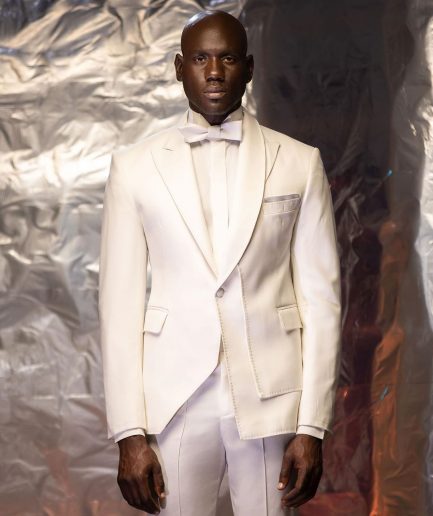 An Ivory White Shawl and peak lapel Tuxedo suit