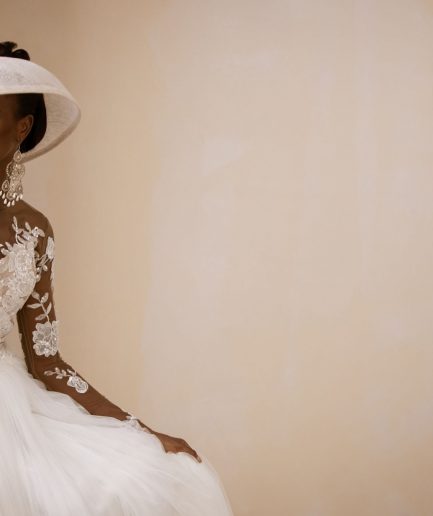 An Ivory Top Patterned Long Sleeve Tulle Wedding gown/dress