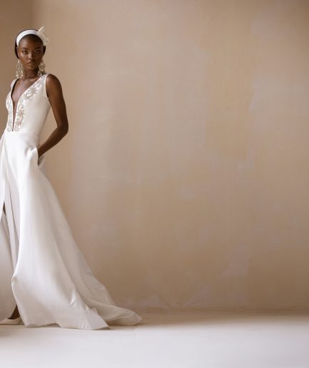 An Ivory Mikado Satin Ball Dress/Gown With Swarovski embellished V-Neckline