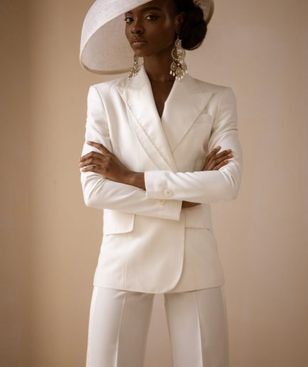 An Ivory White Cross Tuxedo Bridal Suit