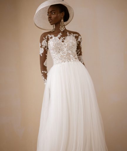 An Ivory Top Patterned Long Sleeve Tulle Wedding gown/dress