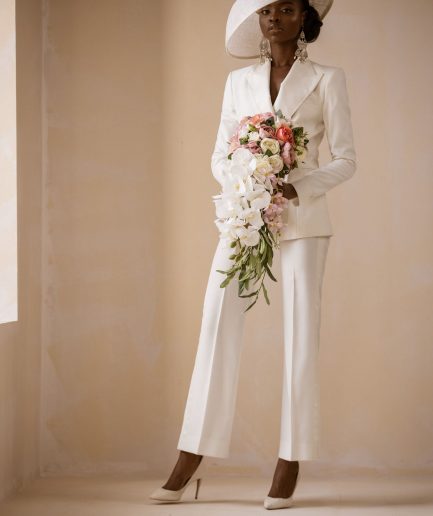An Ivory White Cross Tuxedo Bridal Suit