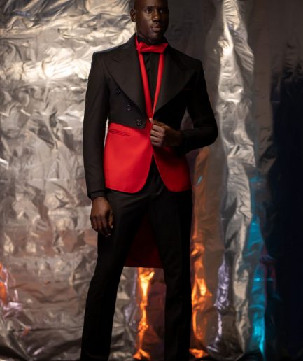 A Charcoal Black Tail Tuxedo Peal Lapel Tuxedo Suit and red Armless One Button Jacket