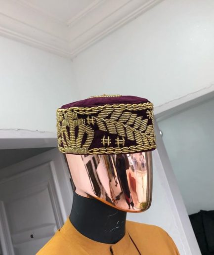 A Burgundy and gold embroidery African traditional hat
