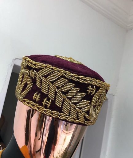 A Burgundy and gold embroidery African traditional hat