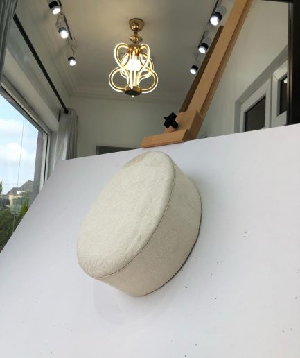 An Ivory White jacquard African Traditional Hat