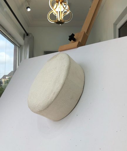 An Ivory White jacquard African Traditional Hat