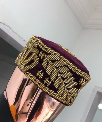 A Burgundy and gold embroidery African traditional hat
