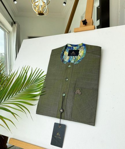 An Irish Green African kaftan with mixed shade of green paisley detailing