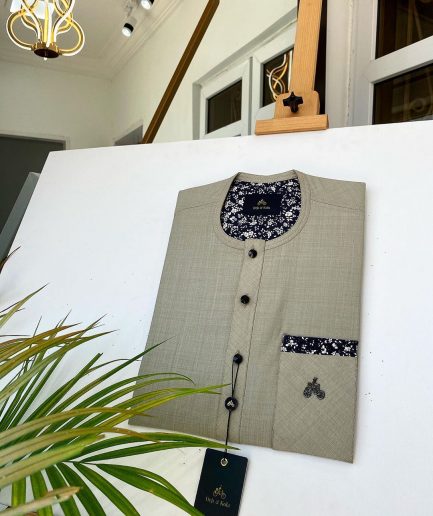 An Irish Light Brown kaftan with a Swarovski stone pocket and buttons