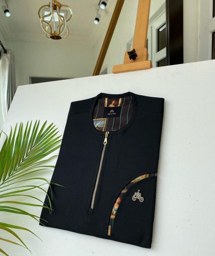 A Charcoal Black with a gold zip opening, a cross-display functional pocket Kaftan