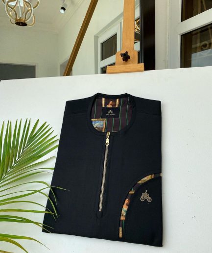 A Charcoal Black with a gold zip opening, a cross-display functional pocket Kaftan