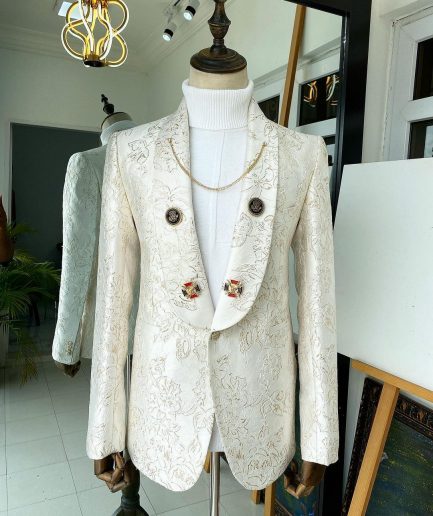 An Ivory Gold Patterned “From The Same Side” Shawl lapel Suit.