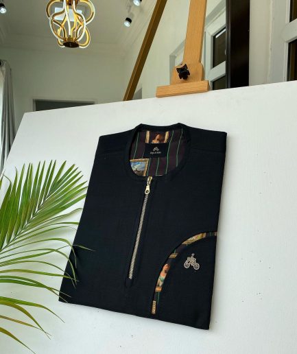 A Charcoal Black with a gold zip opening, a cross-display functional pocket Kaftan