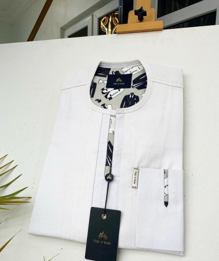 An Ivory white African Kaftan with paisley detailing and sokoto