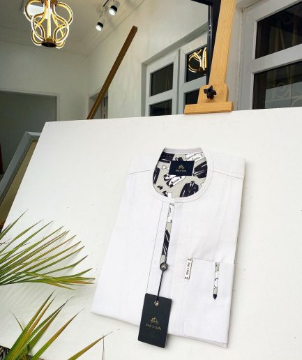 An Ivory white African Kaftan with paisley detailing and sokoto