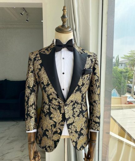 A Gold Patterned Jacquard Peak Label tuxedo suit