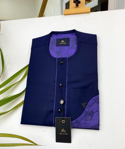 A Navy blue front flap with a clear view of the Swarovski and purple paisley African kaftan