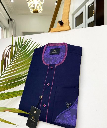 A Navy blue front flap with a clear view of Swarovski crystal buttons, short-sleeve African kaftan