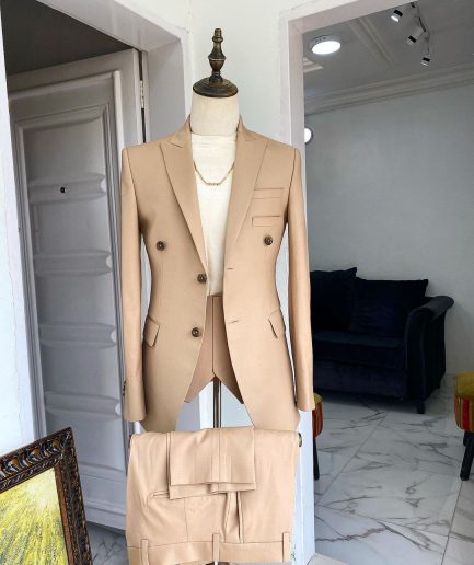 The “Diego Maradona” monochrome Champagne Gold peak lapel business suit
