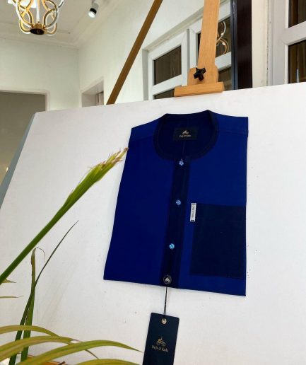 A Mixed shade of blue with a clear view of Swarovski buttons African kaftan and Sokoto