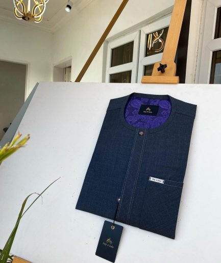 An Irish dark grey kaftan with clear view pearl matching Swarovski button