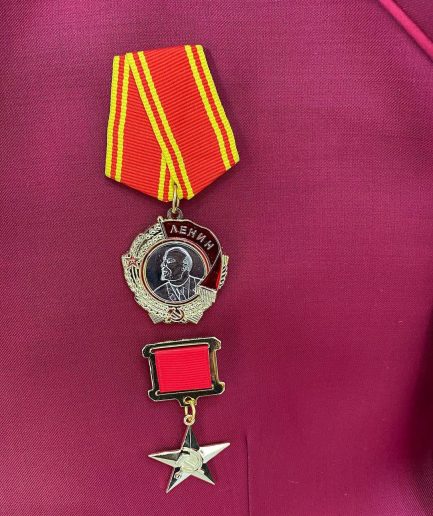 A Wine reloaded “7th Battalion” tuxedo Suit with gold adornment