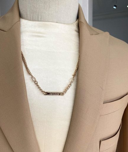 The “Diego Maradona” monochrome Champagne Gold peak lapel business suit