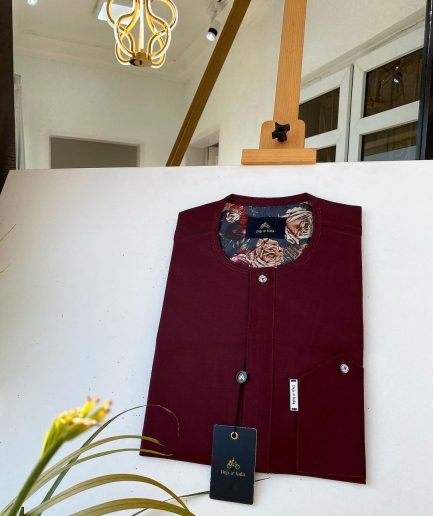 A Burgundy with a clear Swarovski button front flap African Kaftan