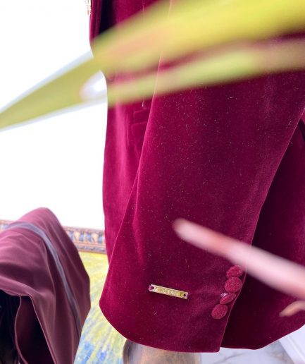 A Reloaded "lacasa de papel'' burgundy Velvet tuxedo suit