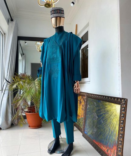 An Emerald Green embroidery Agbada with buba and Sokoto