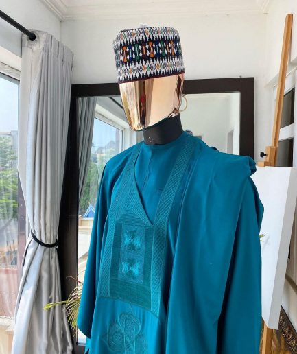 An Emerald Green embroidery Agbada with buba and Sokoto