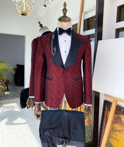 A Shawl lapel jacquard patterned burgundy tuxedo suit