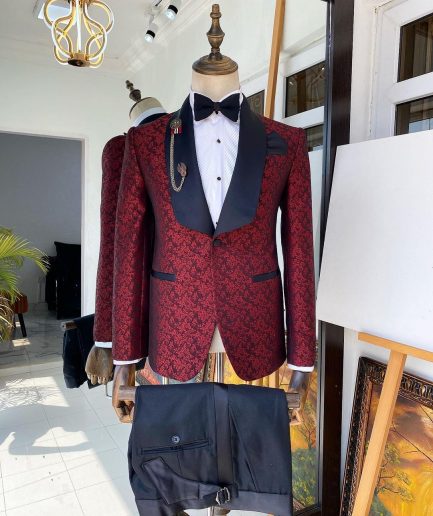 A Shawl lapel jacquard patterned burgundy tuxedo suit