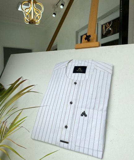 A black stripe and white African kaftan with black Swarovski buttons detailing and sokoto