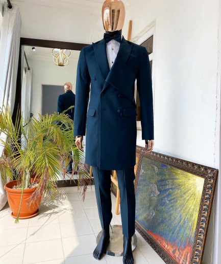 An Emerald green “Oranmiyan” trench blazer suit