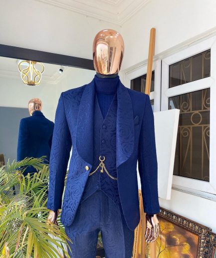 A Navy blue shawl lapel floral pattern jacquard tuxedo suit