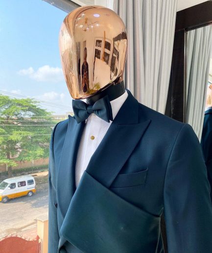 An Emerald green “Oranmiyan” trench blazer suit