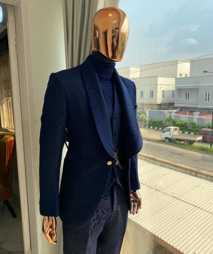 A Navy blue shawl lapel floral pattern jacquard tuxedo suit