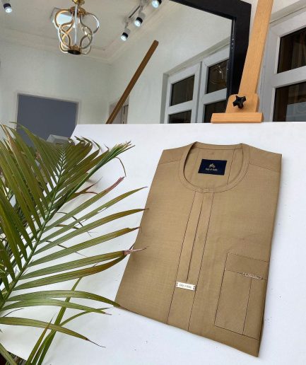 A Champagne Gold African kaftan with interlocking lane design and sokoto