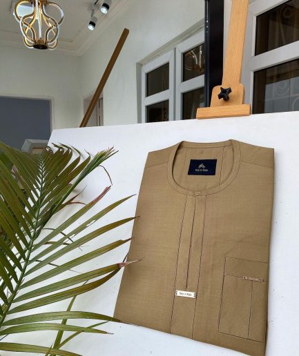 A Champagne Gold African kaftan with interlocking lane design and sokoto