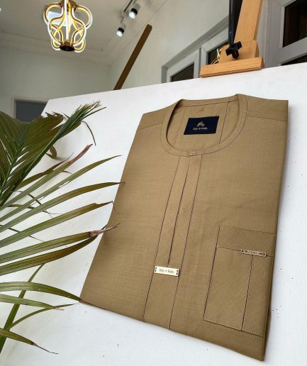 A Champagne Gold African kaftan with interlocking lane design and sokoto