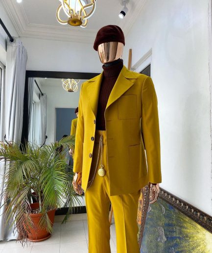 The “ Festac 77” mustard yellow 3 button safari suit